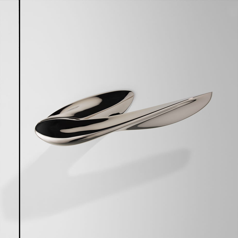 Nexxa door handle by Zaha Hadid and by izé in polished nickel finish.