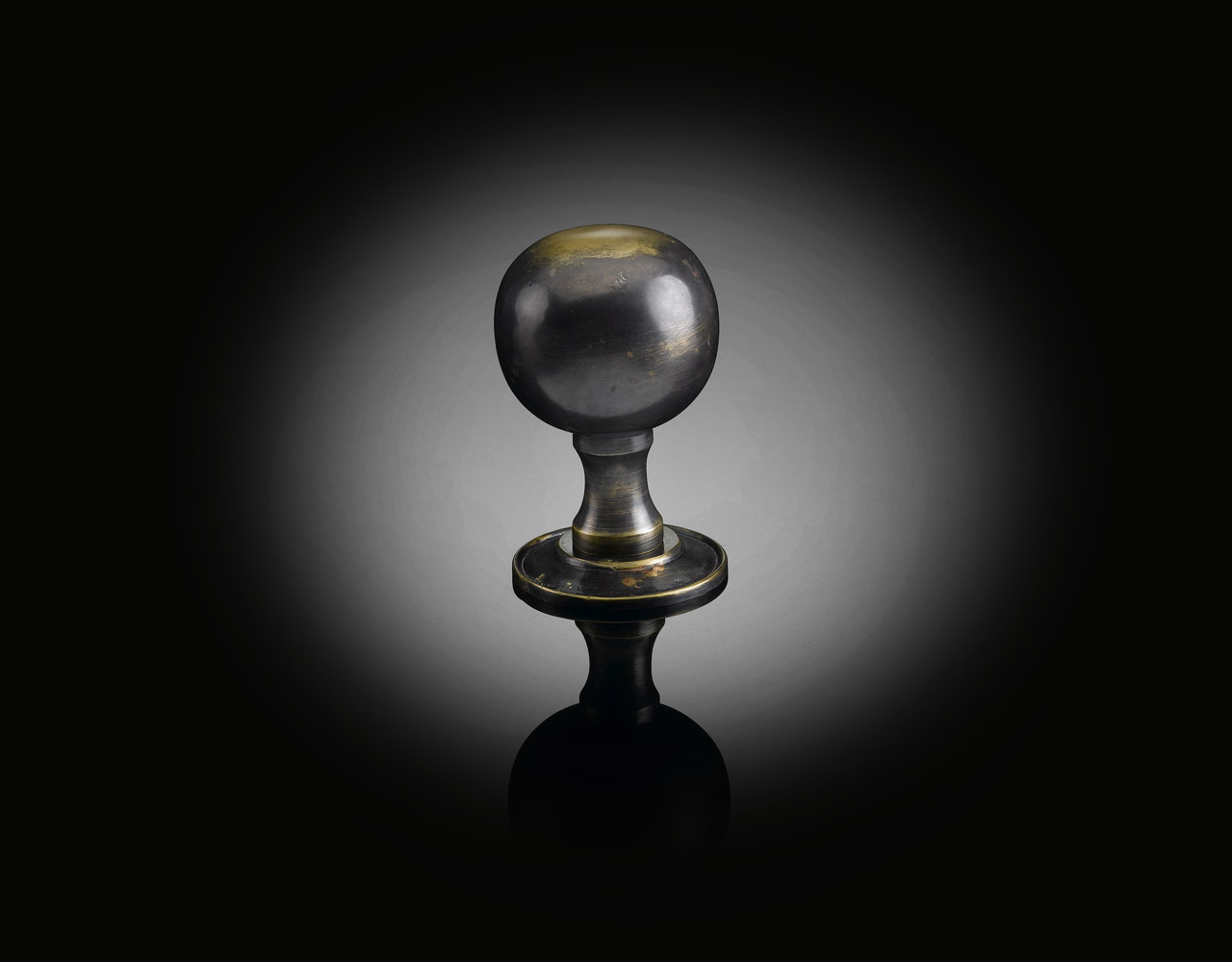 Custom door knob designed by izé in antique finish EHK03